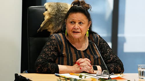 Close up of Aunty Jill Gallagher discussing First Peoples issues in the health system at a Yoorrook public hearing