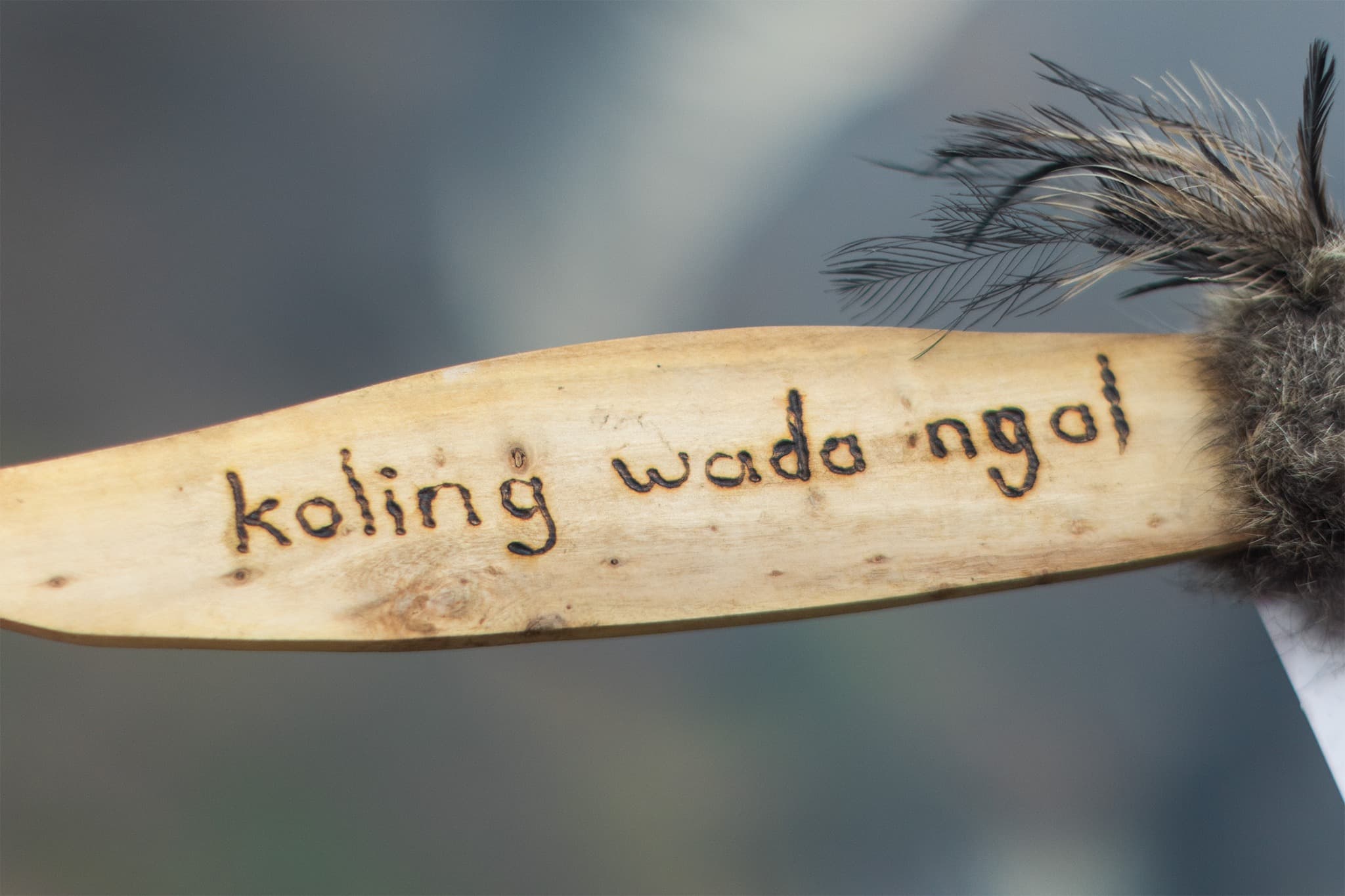 'Koling wada ngat' burned onto a message stick.