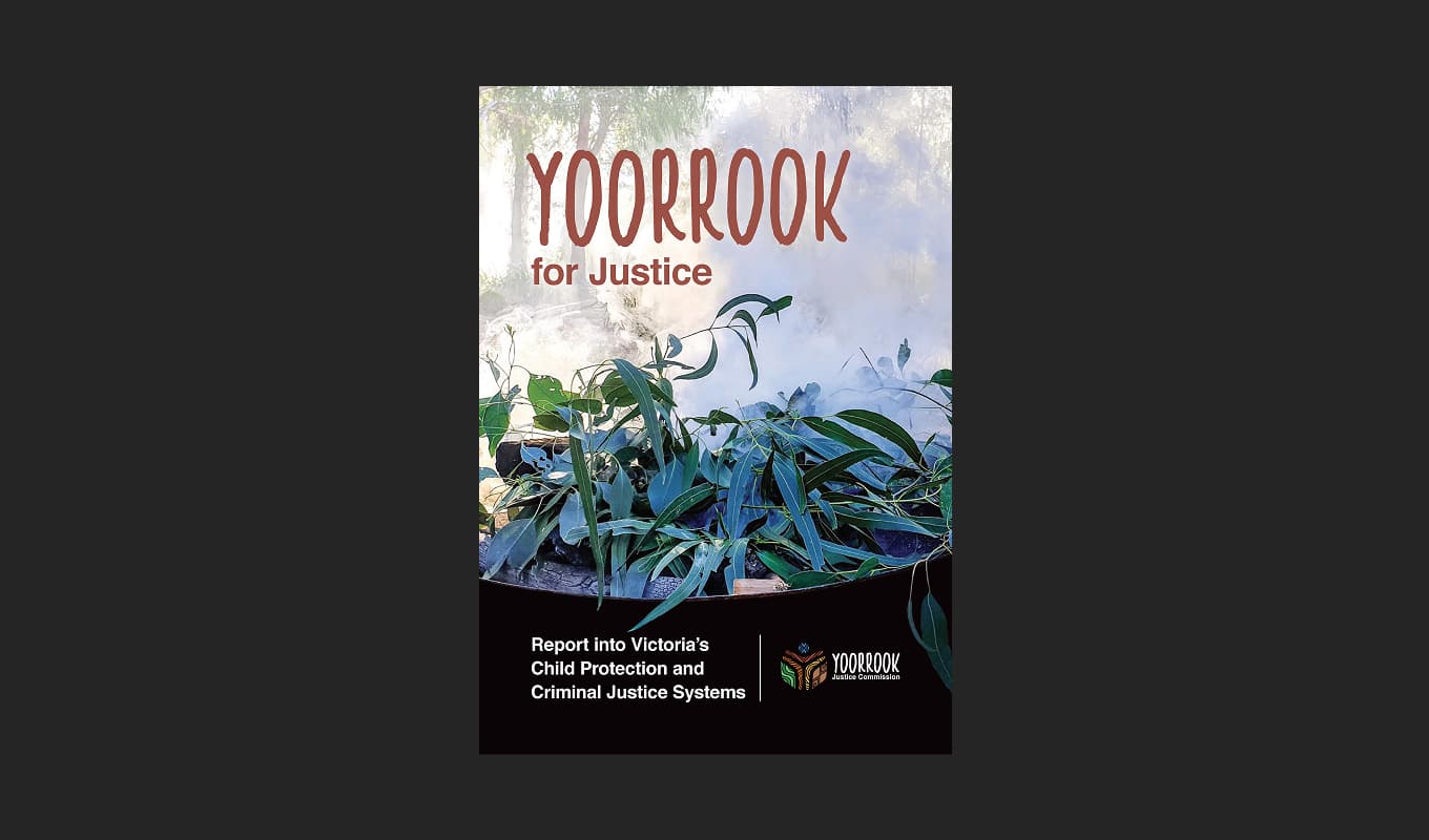 Front cover of the Yoorrook for Justice Report into Victoria's Criminal Justice and Child Protection Systems, featuring gum leaves and smoke in a smoking ceremony.