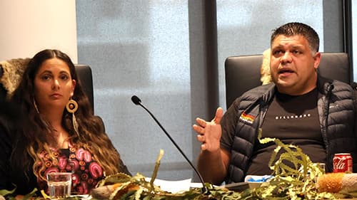 Wotjobaluk man Chris Harrison and Gunditjmara woman Bonnie Dukakis from the Aboriginal Justice Caucus giving evidence to the Yoorrook Justice Commission at the Child Protection System hearing